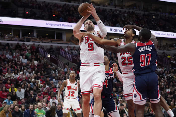 Washington Wizards forward Eugene Omoruyi (97) defends Chicago Bulls center Nikola Vucevic (9)